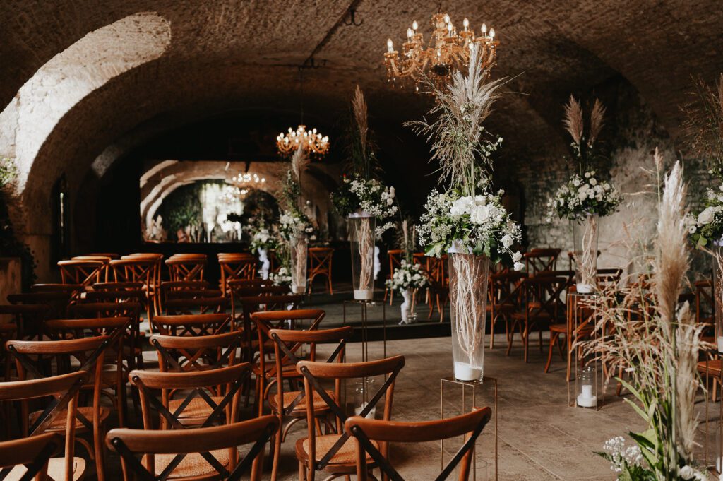 Everything is ready for the ceremony under historic arches at Palazzo Gambara.